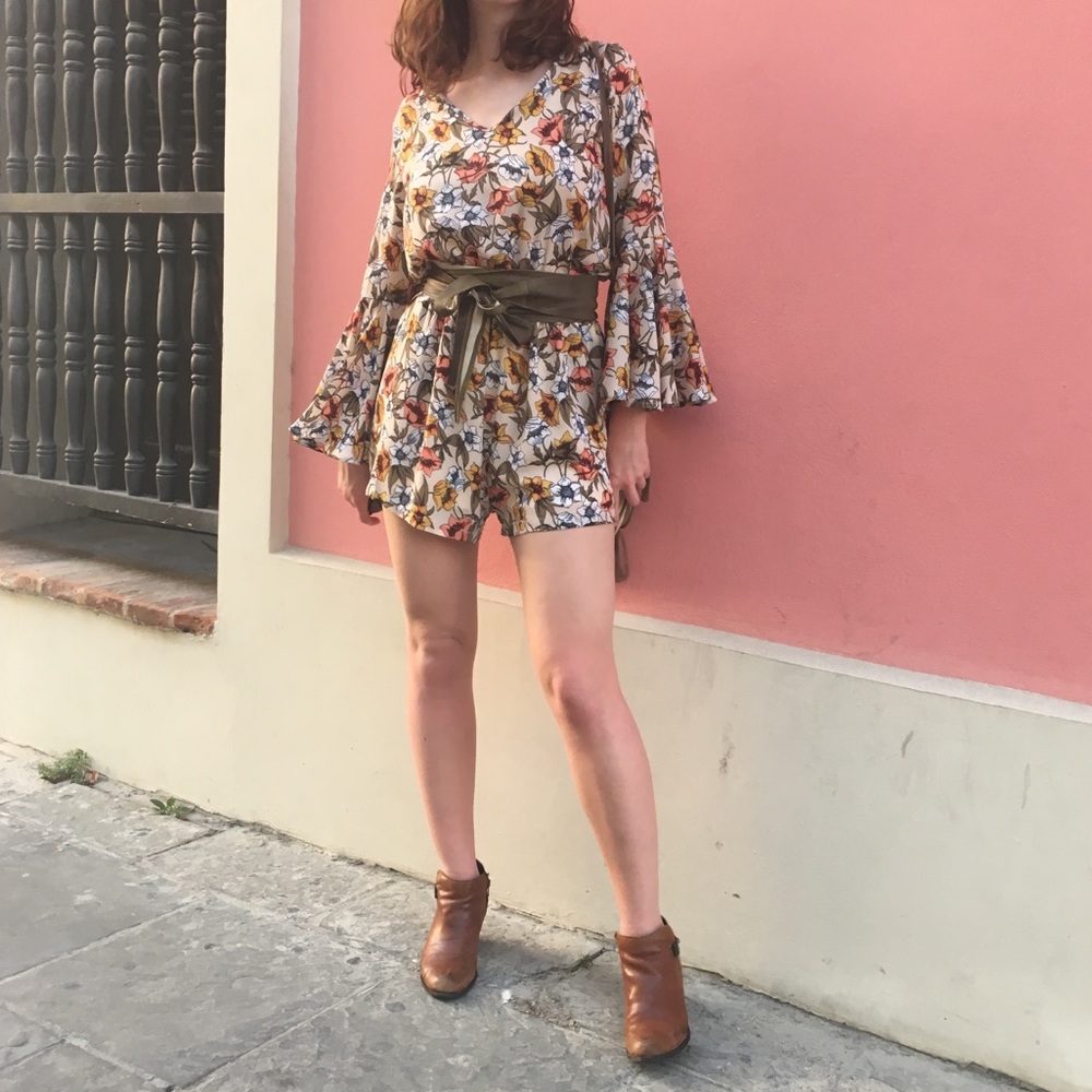 Floral romper with ruffle sleeves, cinched waist